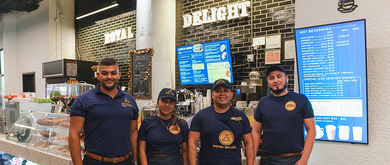 Employees at Royal Delight Cafe - Coffee Shop, Catering & Events in Long Island City.